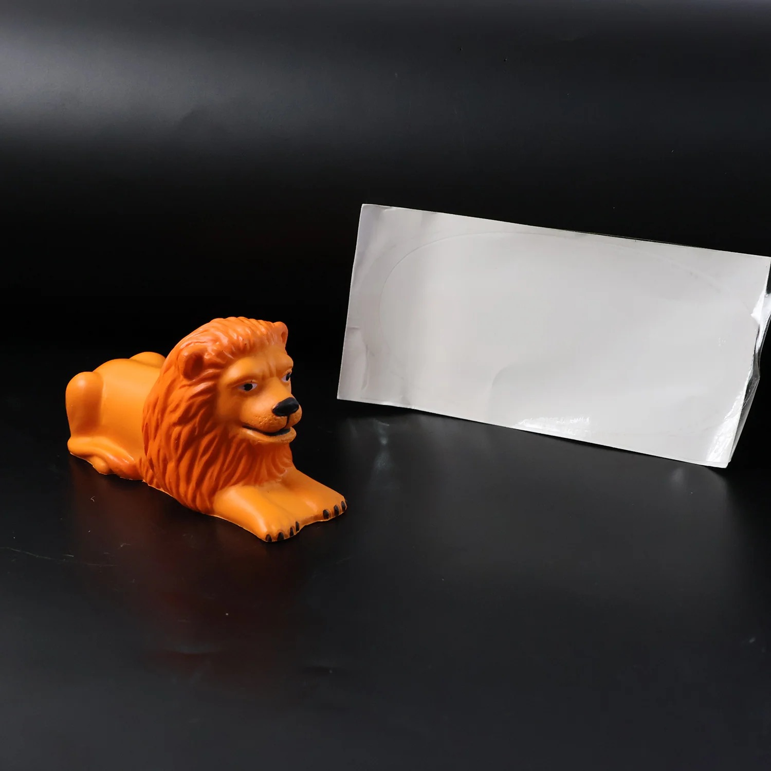 Lion Car Dashboard Toy – Majestic Orange-Gold Ornament with Adhesive Base